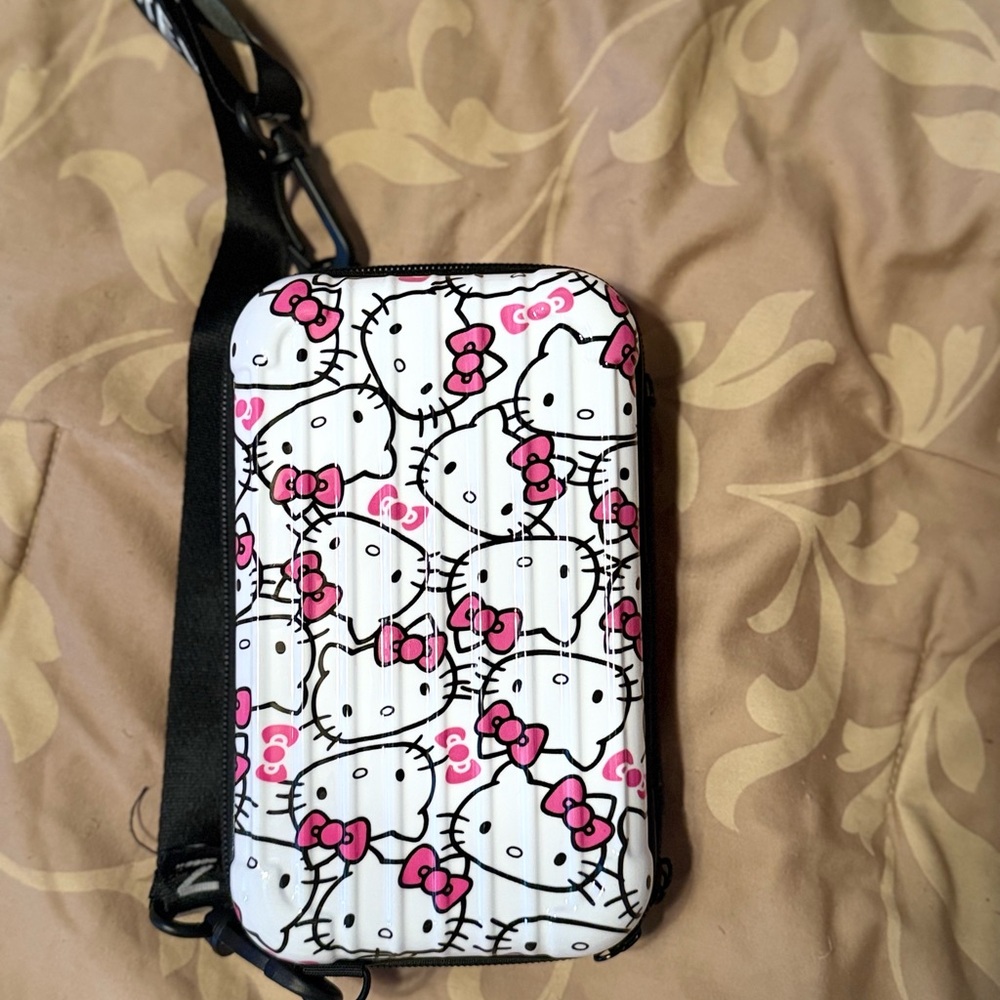 Price for each Hello Kitty White and Pink purse with Strap